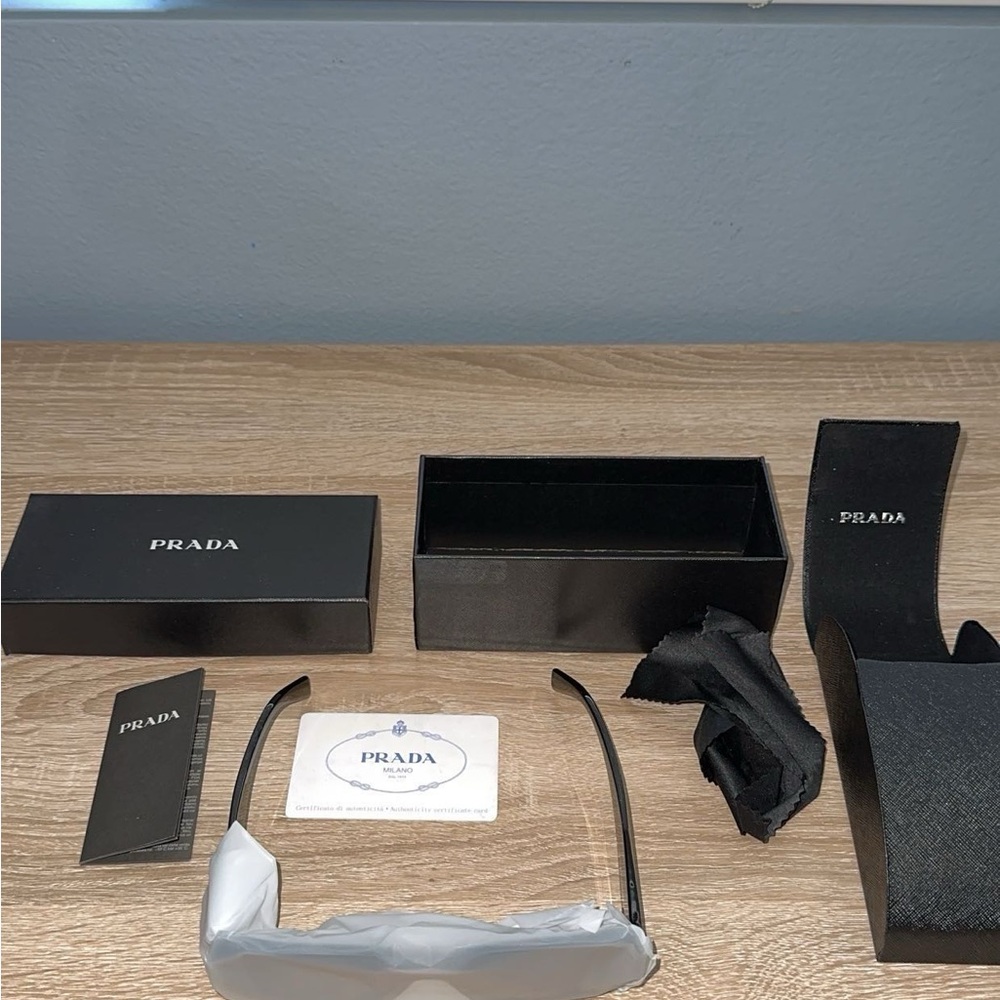 BRAND NEW Prada Sunglasses Unisex( Comes with all tags and boxes and papers!)